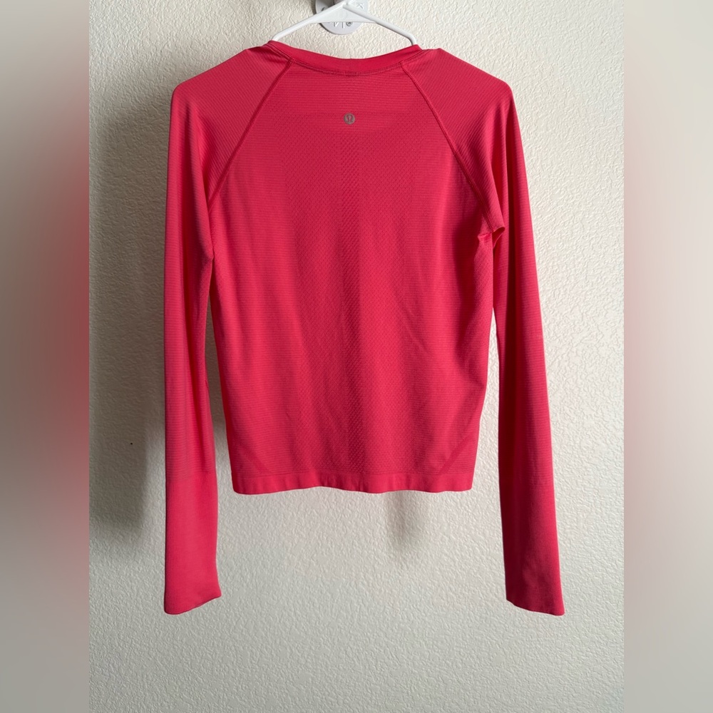 LULULEMON Swiftly Tech Long Sleeve 2.0 Waist Length Top in Pink Dragonfruit